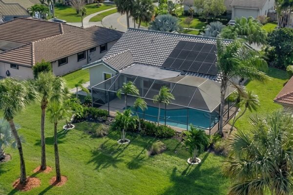 Aerial shot of Florida house with pool.